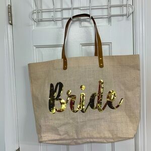 Bride bag, jute with leather straps. Contains zip pouch for just in case items
